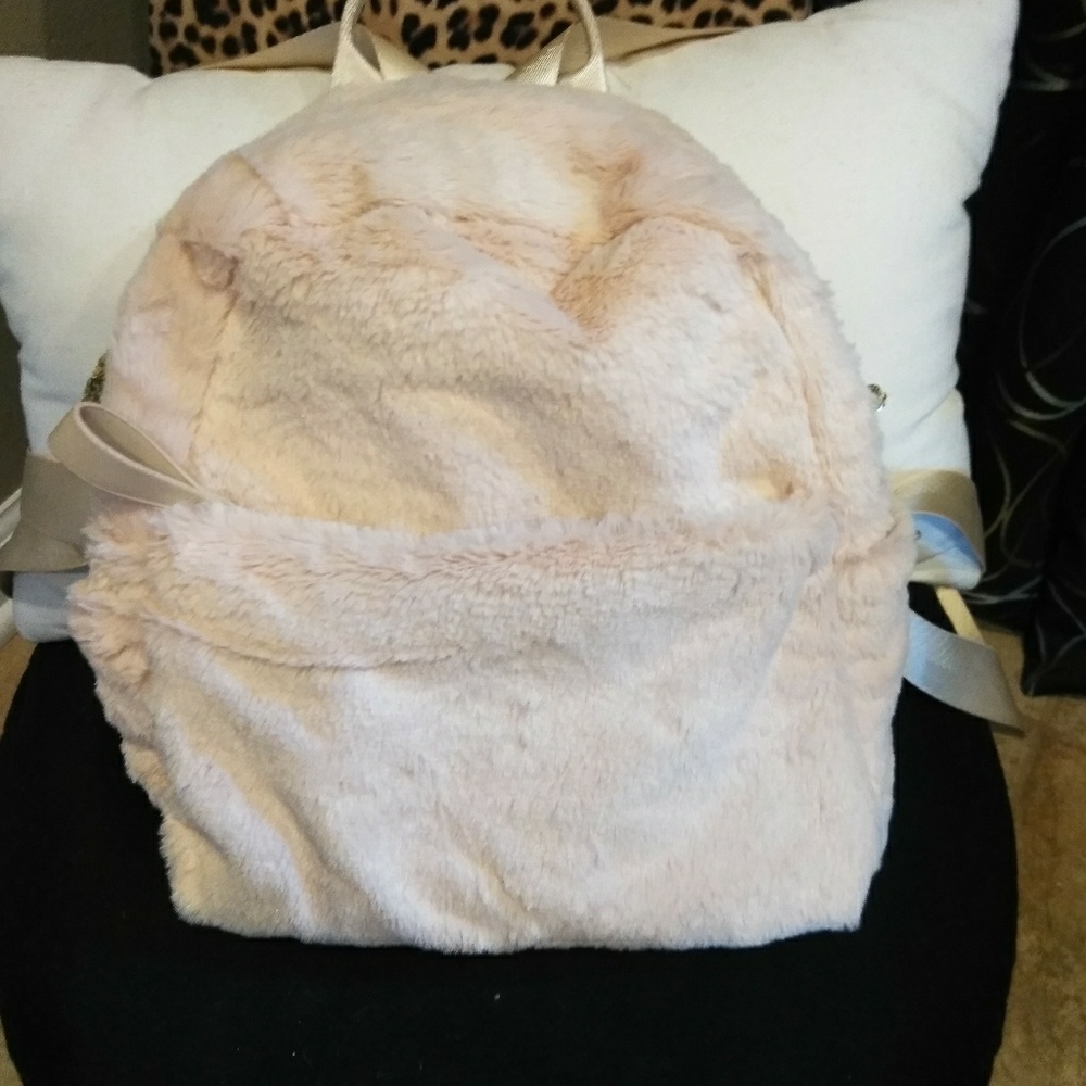 Nwot fuzzy cream backpack